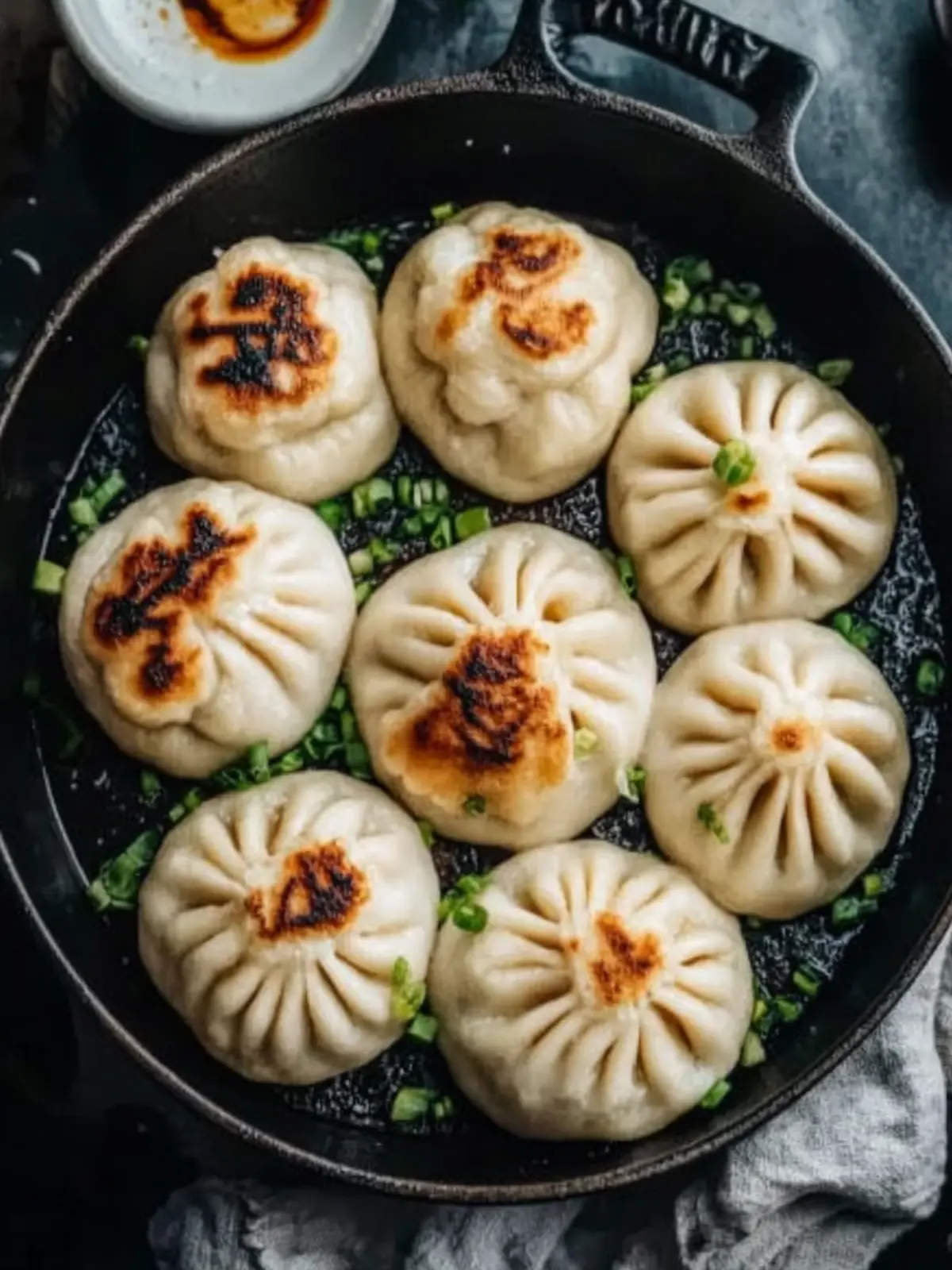 Savory Shanghai Pan-Fried Pork Buns You Can’t Resist 3 Shanghai Pan-Fried Pork Buns