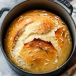 No Knead Dutch Oven Bread with Savory Rosemary Punch 8 No Knead Dutch Oven Bread